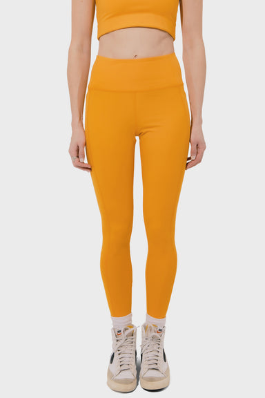 Women's Girlfriend Collective High Rise Compressive Pocket Legging in Golden Glow