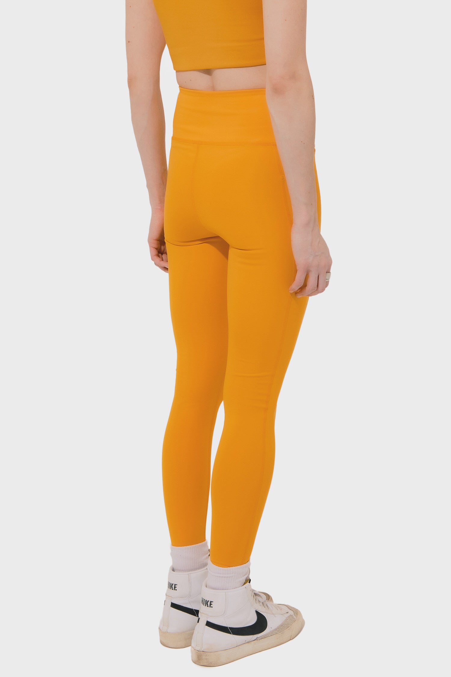 Women's Girlfriend Collective High Rise Compressive Pocket Legging in Golden Glow